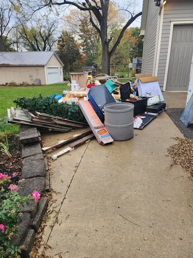 Dumpster being loaded with debris for 30 Yard Dumpster Rental in Waynesboro
